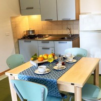 mira hotel e residence tavolo e cucina