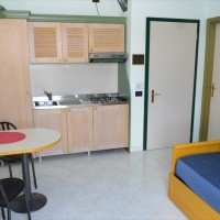 Appartamento con angolo cottura attrezzato e divano letto