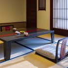 L'interno di un ristorante ryokan è un perfetto equilibrio tra eleganza semplice e comfort tradizionale. Le pareti in legno e carta di riso (shoji) creano un'atmosfera tranquilla e intima.